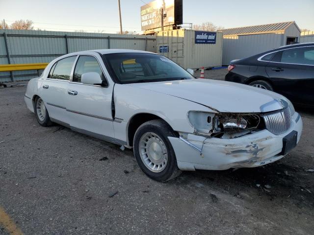 Photo 4 from auction – 2001 LINCOLN TOWN CAR E with VIN 1LNHM81W41Y669105