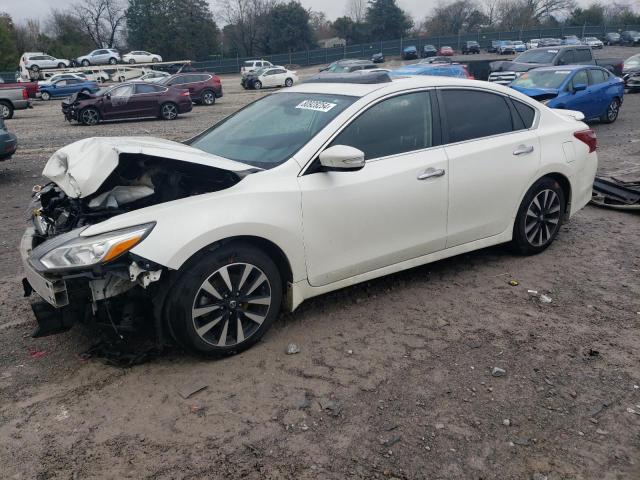 NISSAN ALTIMA 2.5 2018 with VIN 1N4AL3AP9JC205332 - Photo from auction