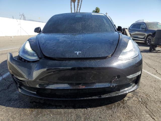 Photo 5 from auction – 2021 TESLA MODEL 3 with VIN 5YJ3E1EA5MF084961