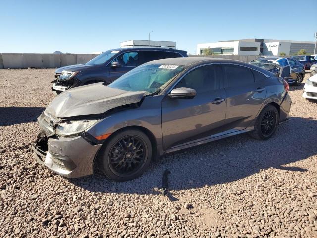 HONDA CIVIC LX 2018 with VIN 2HGFC2F52JH601182 - Photo from auction