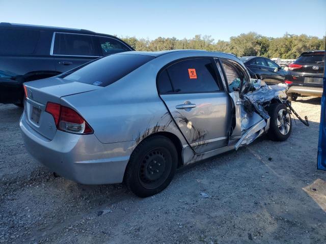 Photo 3 from auction – 2011 HONDA CIVIC LX with VIN 19XFA1F57BE000023