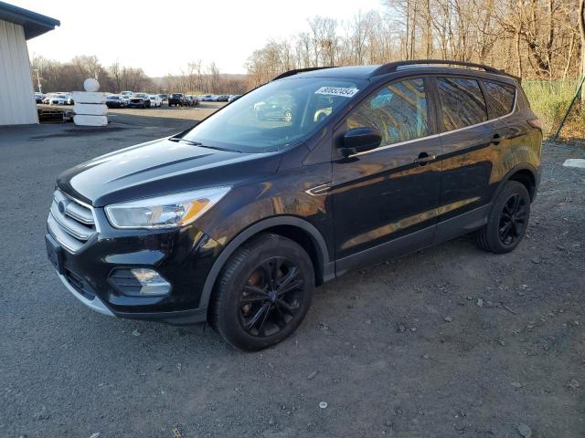 FORD ESCAPE SE 2018 with VIN 1FMCU9GD6JUD06317 - Photo from auction