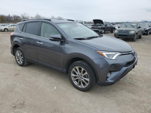 Photo 4 from auction – 2018 TOYOTA RAV4 LIMIT with VIN JTMDFREV7JD239712