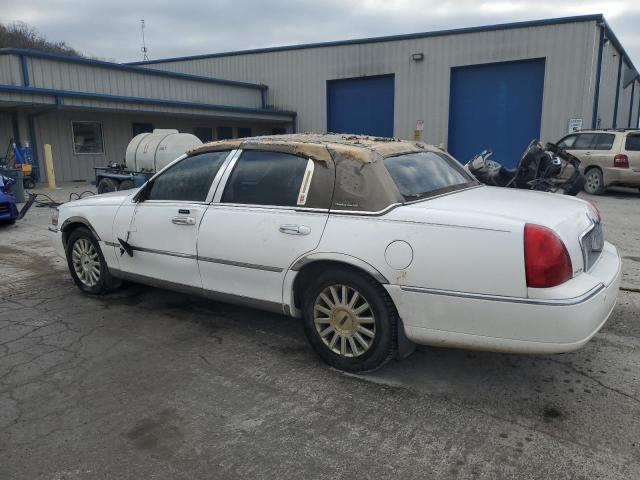 Photo 2 from auction – 2004 LINCOLN TOWN CAR E with VIN 1LNHM81W14Y619797