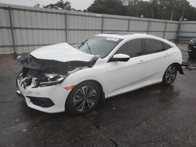 Photo 1 from auction – 2018 HONDA CIVIC EX with VIN JHMFC1F39JX039623