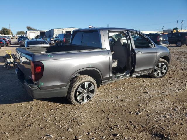 Photo 3 from auction – 2017 HONDA RIDGELINE with VIN 5FPYK3F76HB029512