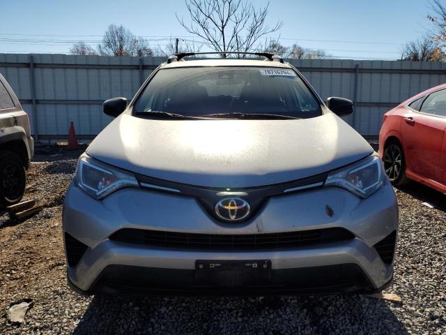 Photo 5 from auction – 2018 TOYOTA RAV4 LE with VIN 2T3BFREV2JW722728