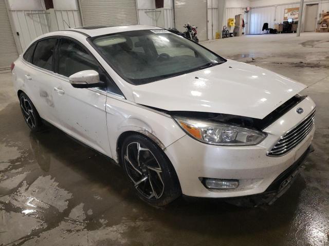 Photo 4 from auction – 2015 FORD FOCUS TITA with VIN 1FADP3J28FL221552
