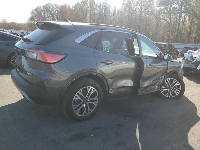 Photo 3 from auction – 2021 FORD ESCAPE SEL with VIN 1FMCU9H63MUA28433