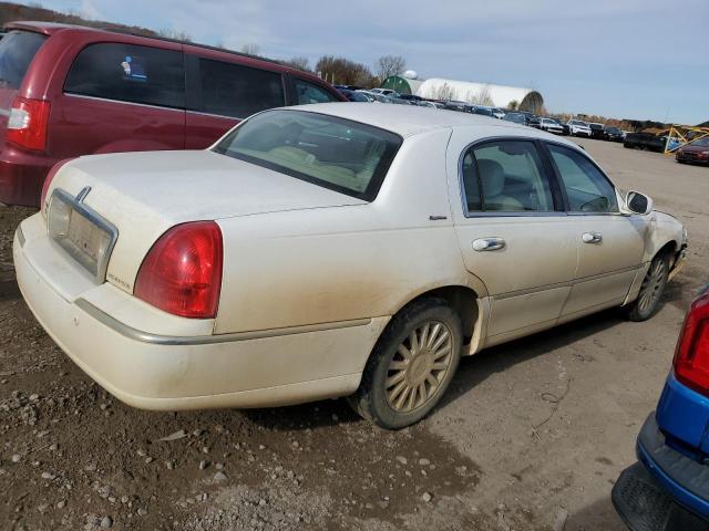 Photo 3 from auction – 2004 LINCOLN TOWN CAR E with VIN 1LNHM81W74Y648110
