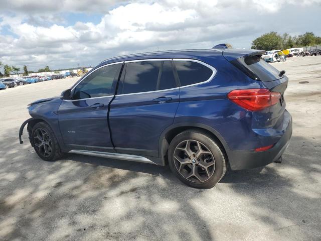 Photo 2 from auction – 2016 BMW X1 XDRIVE2 with VIN WBXHT3C31G5E55086