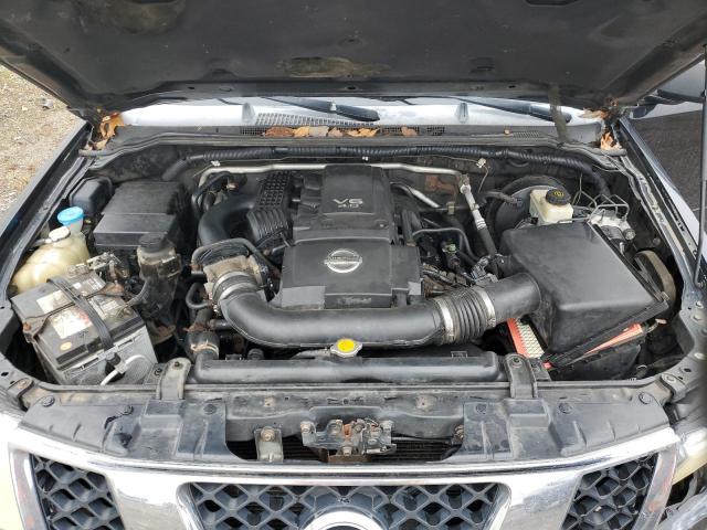 Photo 11 from auction – 2005 NISSAN FRONTIER K with VIN 1N6AD06WX5C411722
