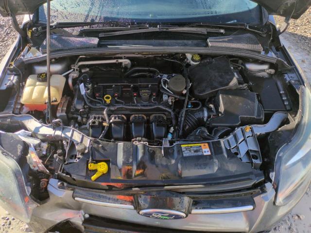 Photo 11 from auction – 2014 FORD FOCUS TITA with VIN 1FADP3N28EL168537
