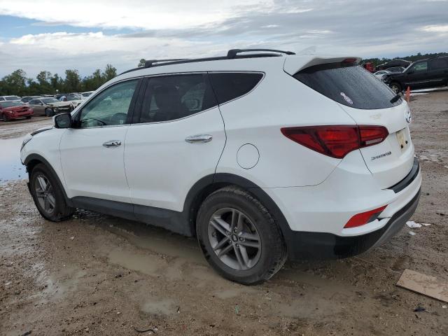 Photo 2 from auction – 2018 HYUNDAI SANTA FE S with VIN 5NMZU3LB7JH090338