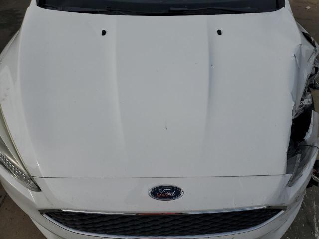 Photo 11 from auction – 2016 FORD FOCUS SE with VIN 1FADP3F29GL284251