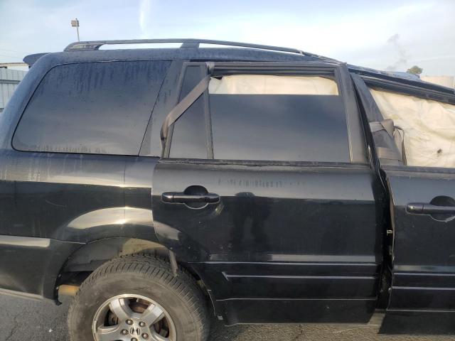 Photo 11 from auction – 2006 HONDA PILOT EX with VIN 2HKYF18566H508900