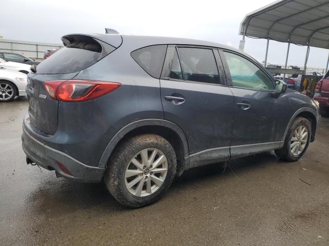 Photo 3 from auction – 2013 MAZDA CX-5 TOURI with VIN JM3KE4CE1D0124767