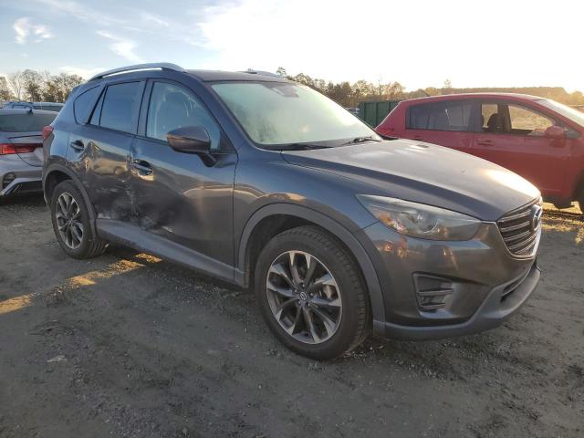 Photo 4 from auction – 2016 MAZDA CX-5 GT with VIN JM3KE2DY1G0687223