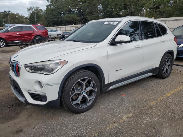 BMW X1 XDRIVE2 2016 with VIN WBXHT3C31GP880566 - Photo from auction