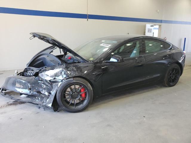 TESLA MODEL 3 2021 with VIN 5YJ3E1EC4MF990908 - Photo from auction