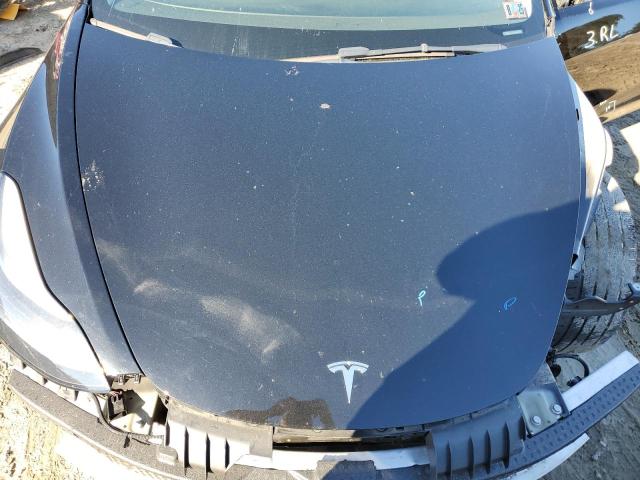 Photo 11 from auction – 2022 TESLA MODEL 3 with VIN 5YJ3E1EA4NF287017