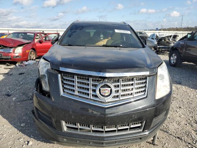 Photo 5 from auction – 2014 CADILLAC SRX LUXURY with VIN 3GYFNBE32ES565290