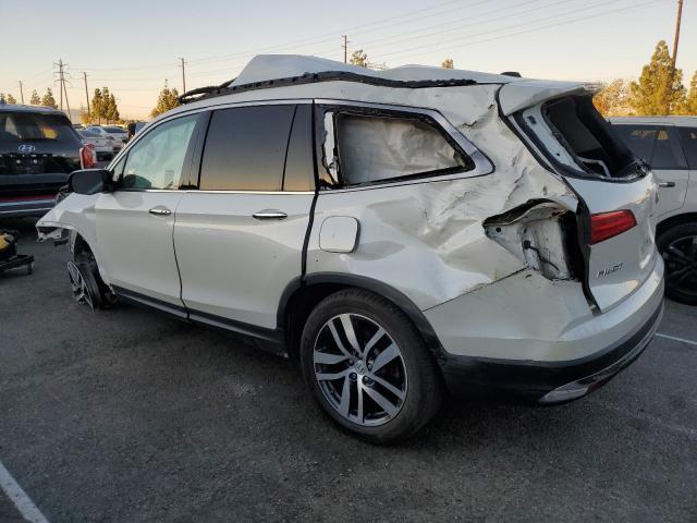 Photo 2 from auction – 2016 HONDA PILOT TOUR with VIN 5FNYF6H97GB056312