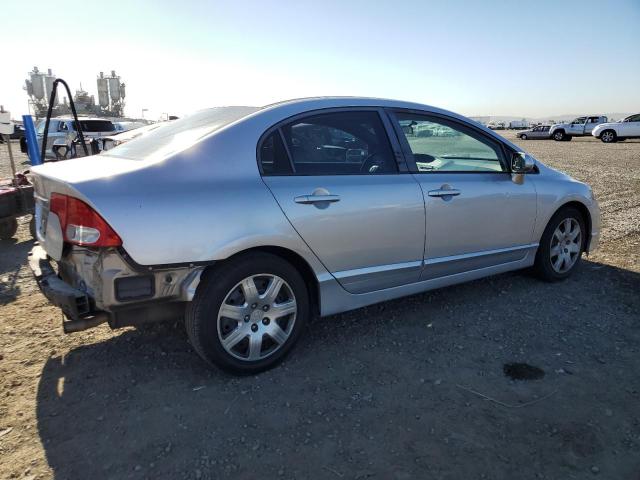 Photo 3 from auction – 2011 HONDA CIVIC LX with VIN 19XFA1F5XBE034800