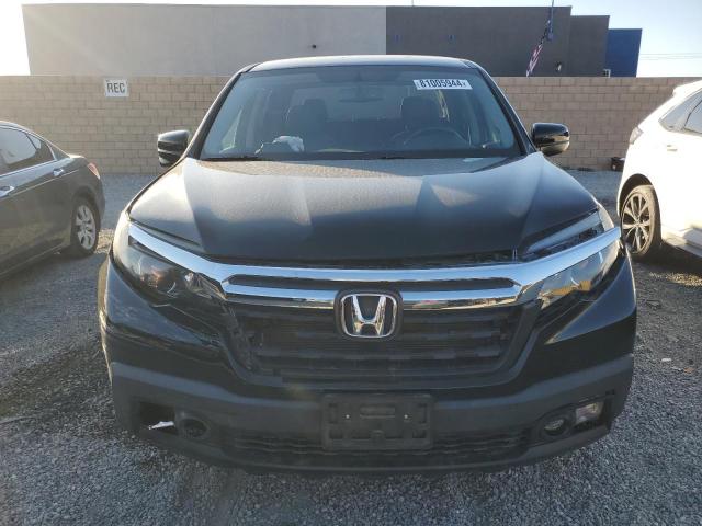 Photo 5 from auction – 2018 HONDA RIDGELINE with VIN 5FPYK2F66JB000390