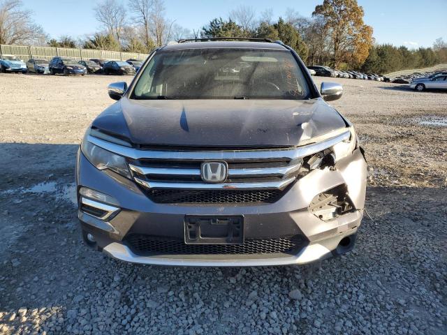 Photo 5 from auction – 2016 HONDA PILOT ELIT with VIN 5FNYF6H07GB033243