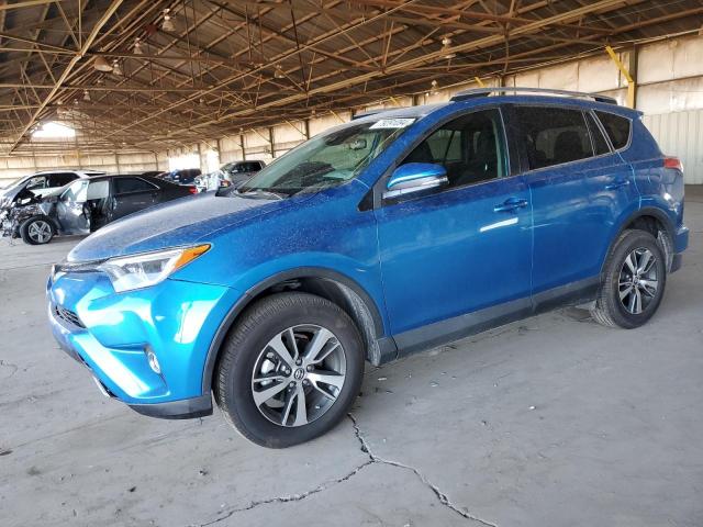TOYOTA RAV4 XLE 2017 with VIN 2T3WFREV5HW385693 - Photo from auction