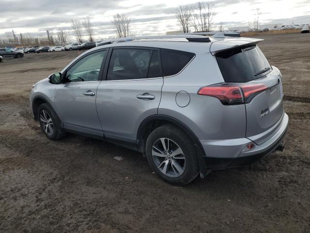 Photo 2 from auction – 2018 TOYOTA RAV4 LE with VIN 2T3ZFREV2JW520423