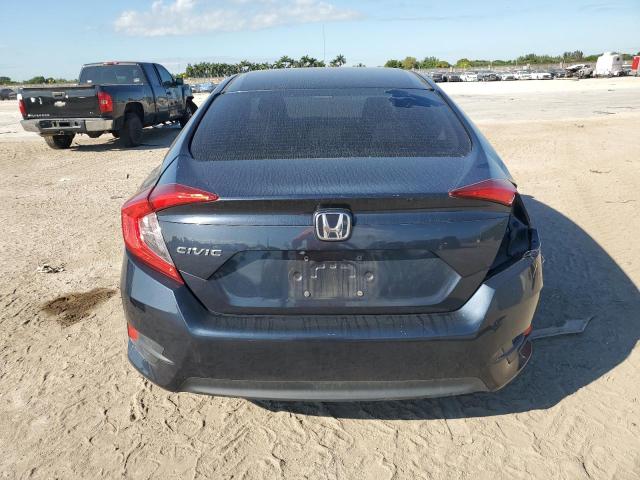 Photo 6 from auction – 2018 HONDA CIVIC LX with VIN 19XFC2F58JE009361