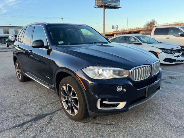 BMW X5 XDRIVE5 2015 with VIN 5UXKR6C55F0J77997 - Photo from auction