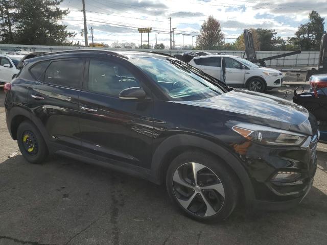 Photo 4 from auction – 2016 HYUNDAI TUCSON LIM with VIN KM8J33A22GU122516