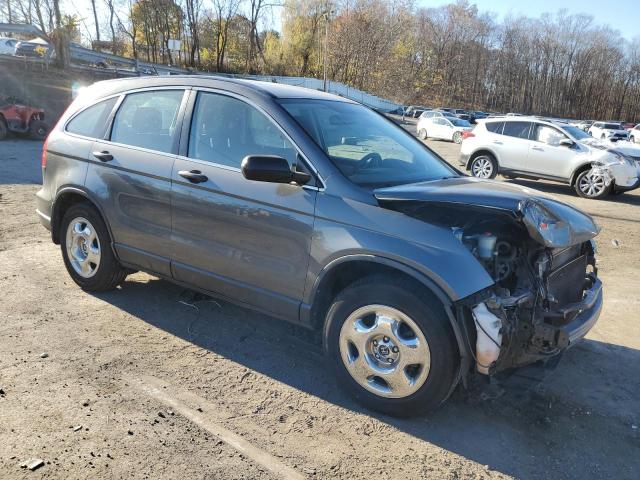 Photo 4 from auction – 2011 HONDA CR-V LX with VIN 5J6RE4H36BL099093