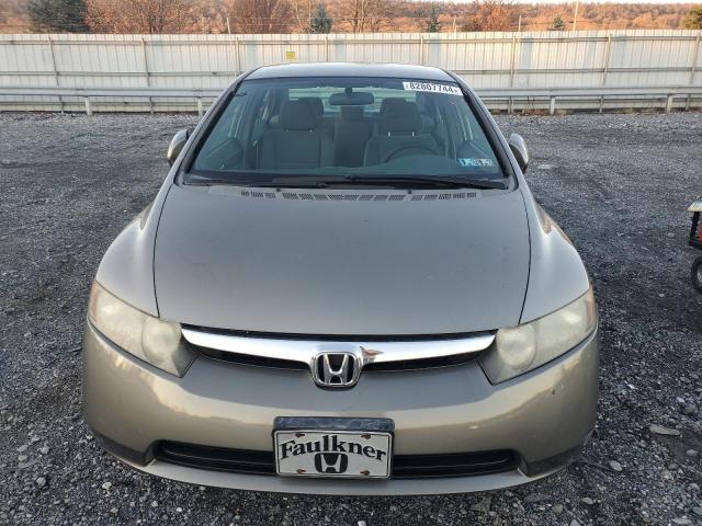 Photo 5 from auction – 2006 HONDA CIVIC LX with VIN 1HGFA16596L087650