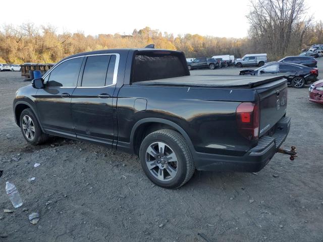 Photo 2 from auction – 2017 HONDA RIDGELINE with VIN 5FPYK3F58HB014234