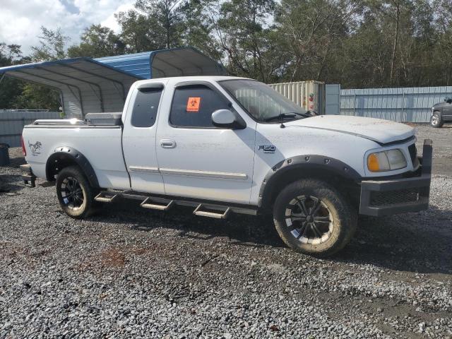 Photo 4 from auction – 2003 FORD F150 with VIN 1FTRX18L63NB23817