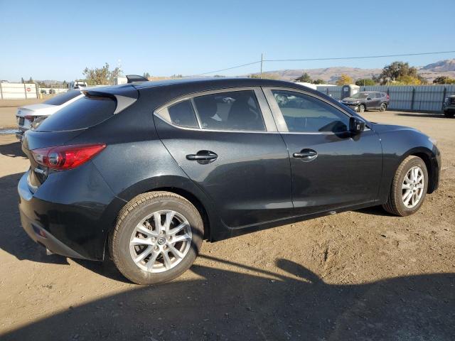 Photo 3 from auction – 2014 MAZDA 3 TOURING with VIN JM1BM1L70E1115985