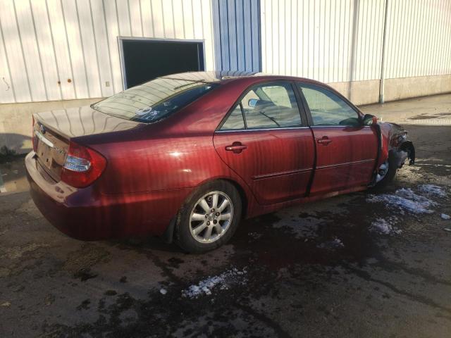 Photo 3 from auction – 2002 TOYOTA CAMRY LE with VIN JTDBE30K220107275