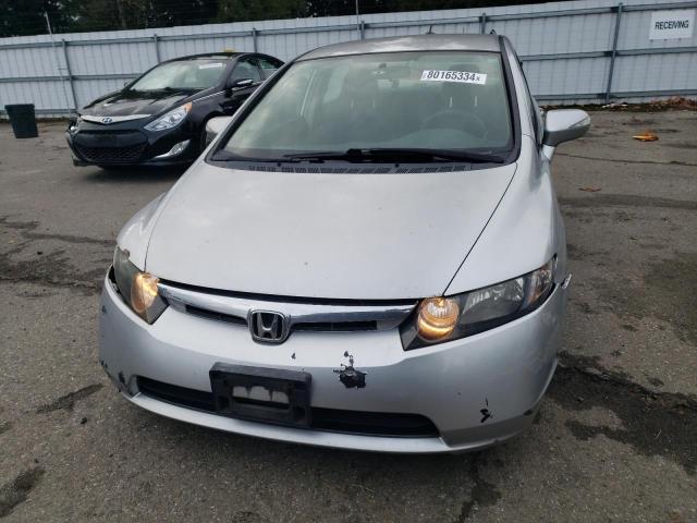 Photo 5 from auction – 2007 HONDA CIVIC HYBR with VIN JHMFA36207S026953