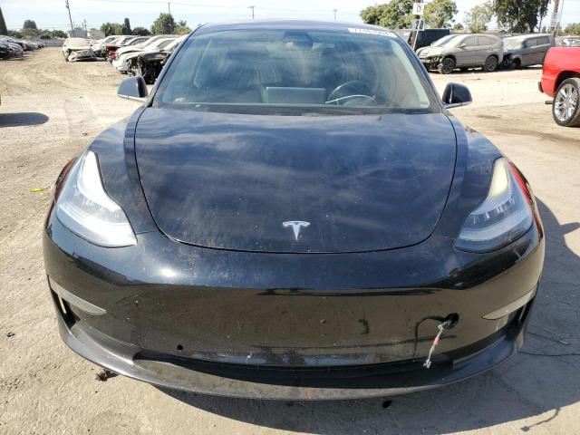 Photo 5 from auction – 2018 TESLA MODEL 3 with VIN 5YJ3E1EA3JF004438