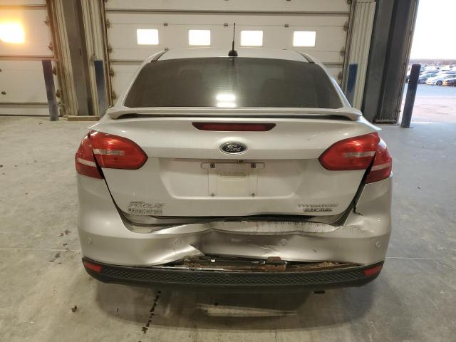 Photo 6 from auction – 2016 FORD FOCUS TITA with VIN 1FADP3J26GL267690