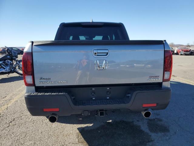 Photo 6 from auction – 2021 HONDA RIDGELINE with VIN 5FPYK3F17MB001269