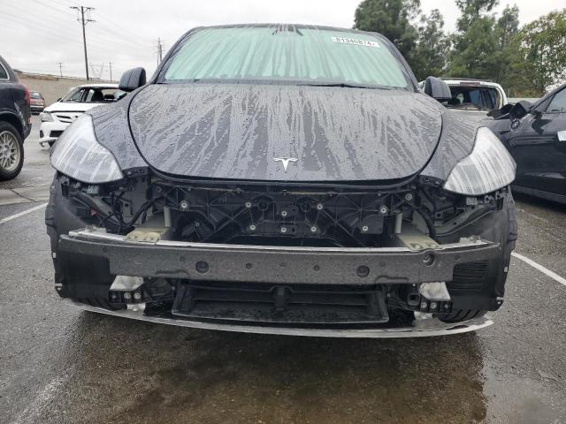 Photo 5 from auction – 2023 TESLA MODEL Y with VIN 7SAYGDEE3PF917443