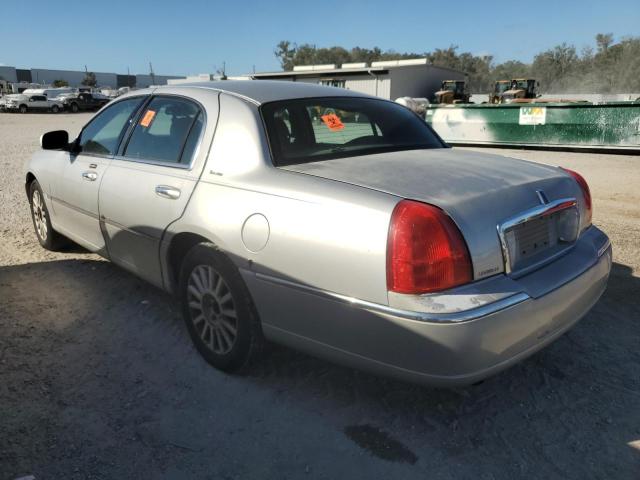 Photo 2 from auction – 2003 LINCOLN TOWN CAR E with VIN 1LNHM81W23Y671549