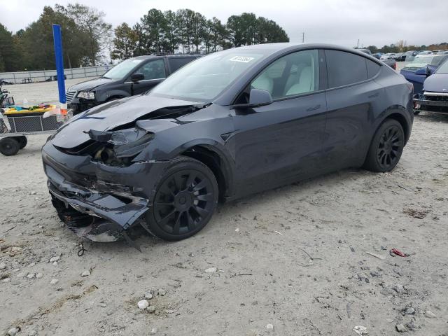 TESLA MODEL Y 2024 with VIN 7SAYGAEE2RF068357 - Photo from auction
