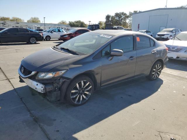 HONDA CIVIC EXL 2015 with VIN 2HGFB2F95FH511327 - Photo from auction