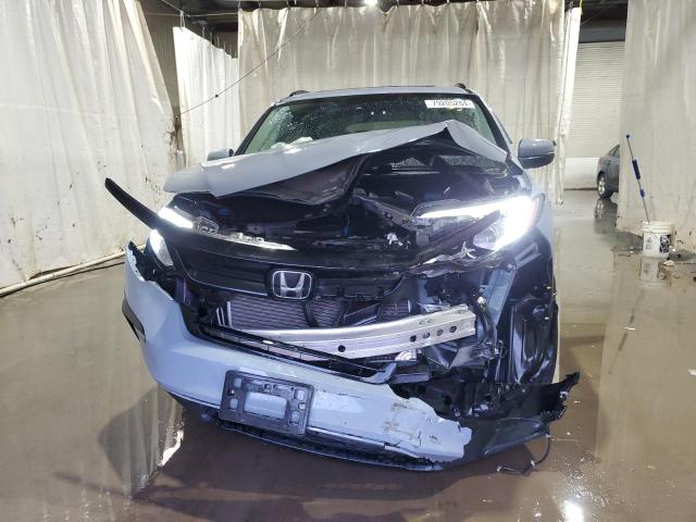 Photo 5 from auction – 2022 HONDA PILOT SE with VIN 5FNYF6H26NB070430